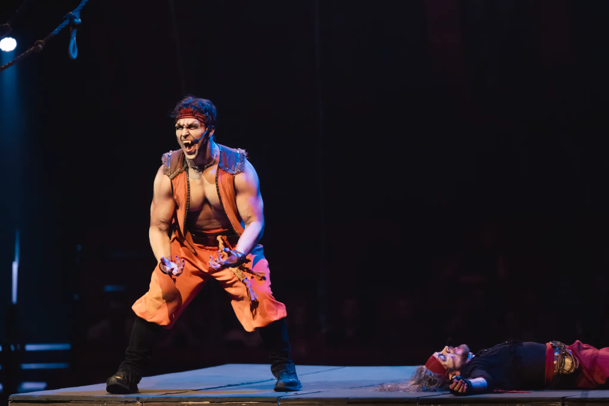 Andre Baptiste flexing on the Vampirates stage